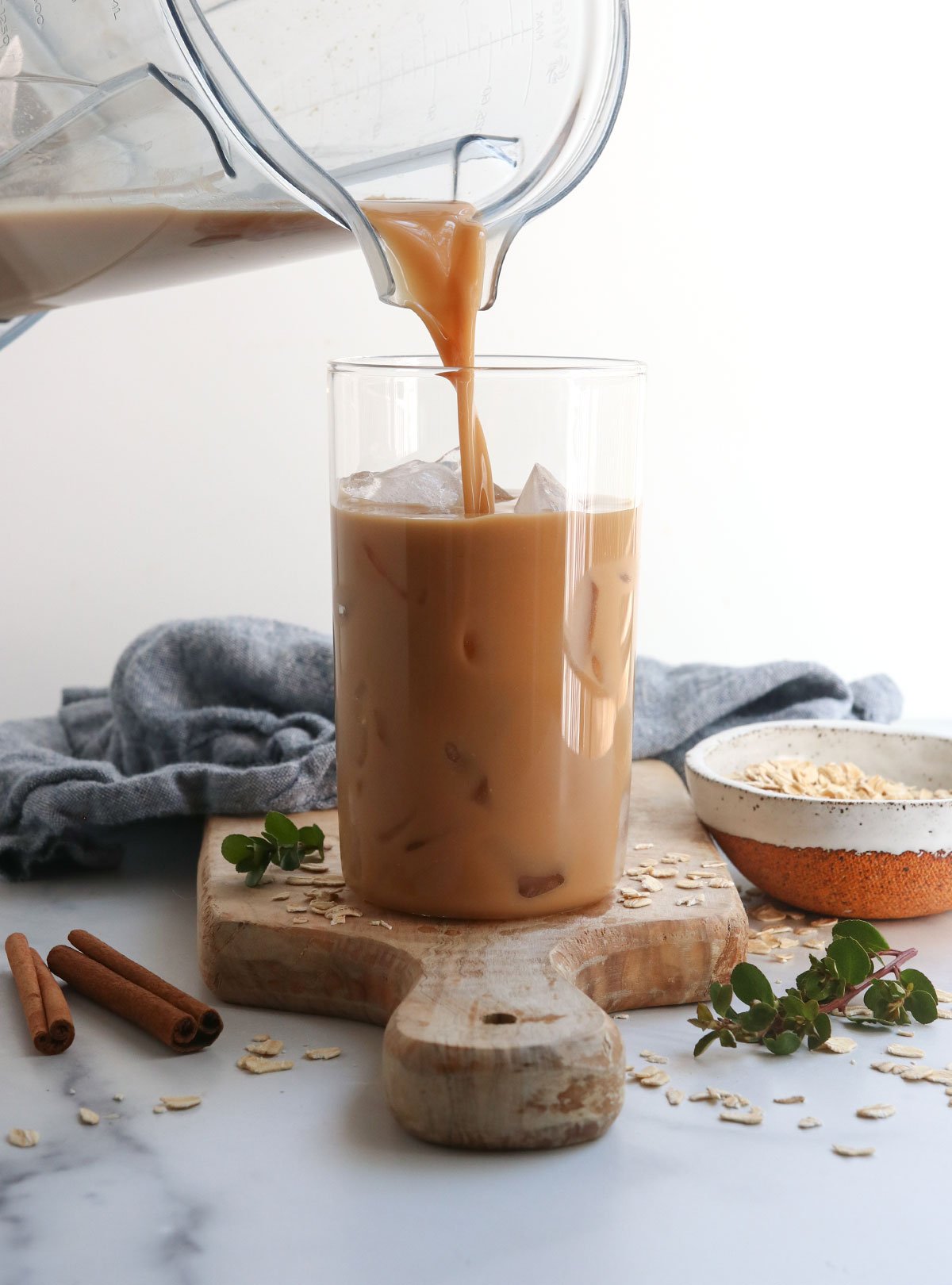 iced latte poured from blender into glass