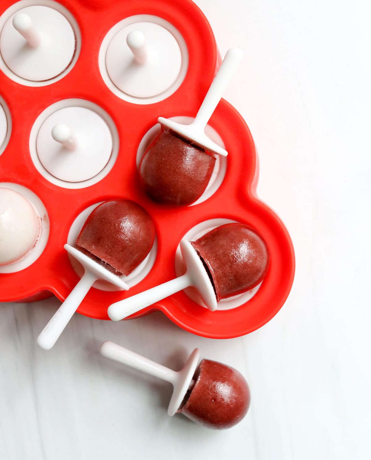 elderberry popsicles in a small ice pop mold