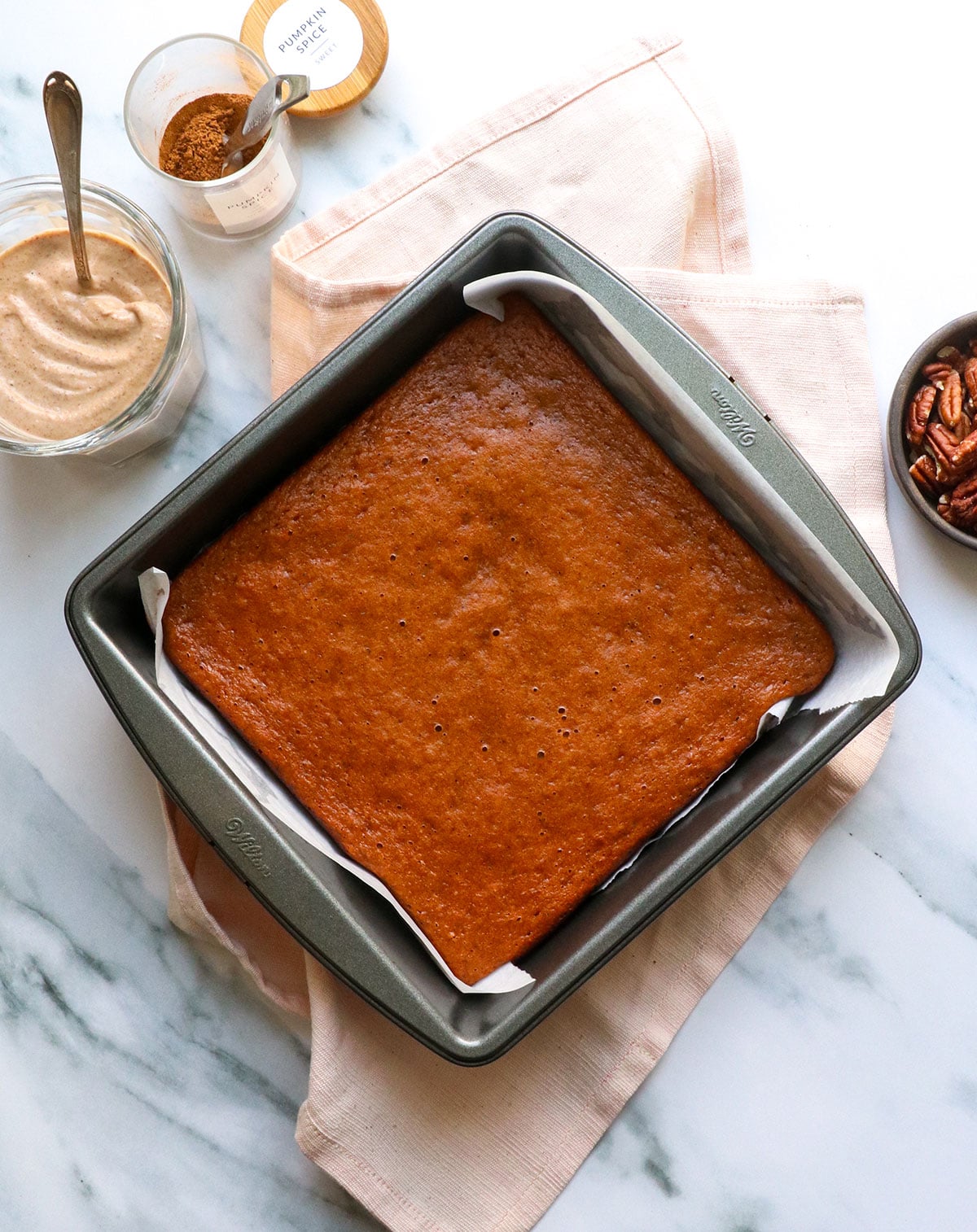 healthy pumpkin bars baked in a pan. 