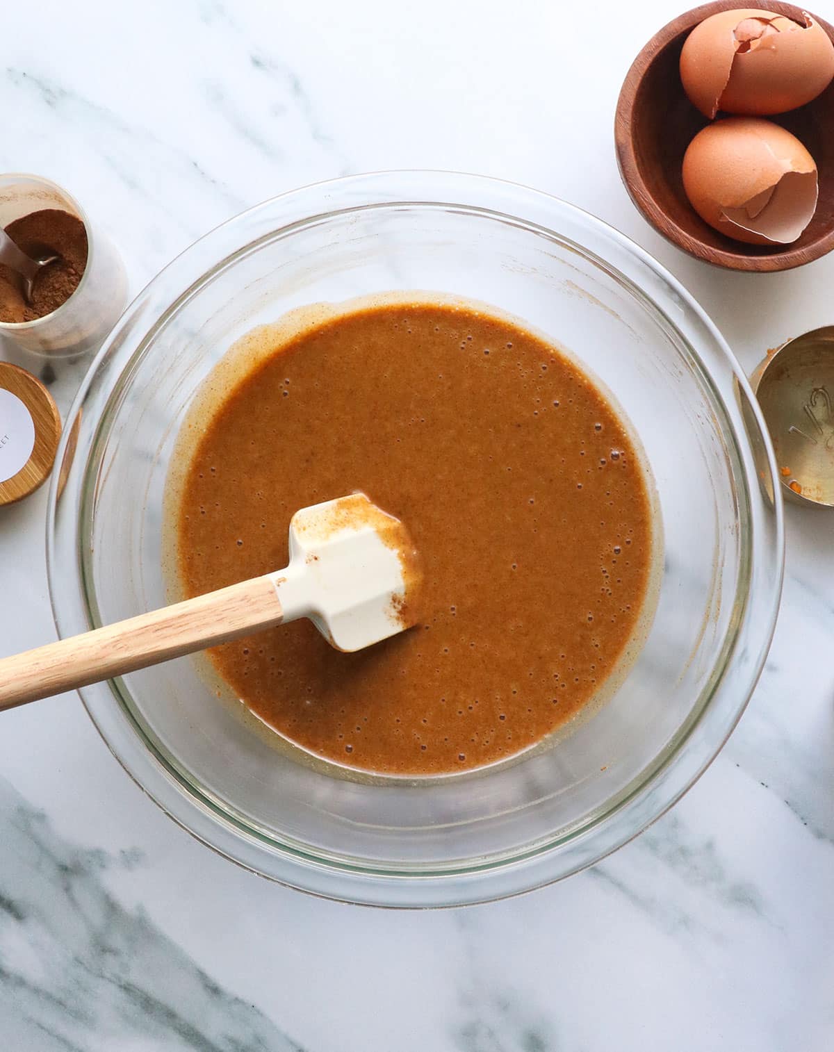pumpkin bar mixture stirred in a glass bowl. 
