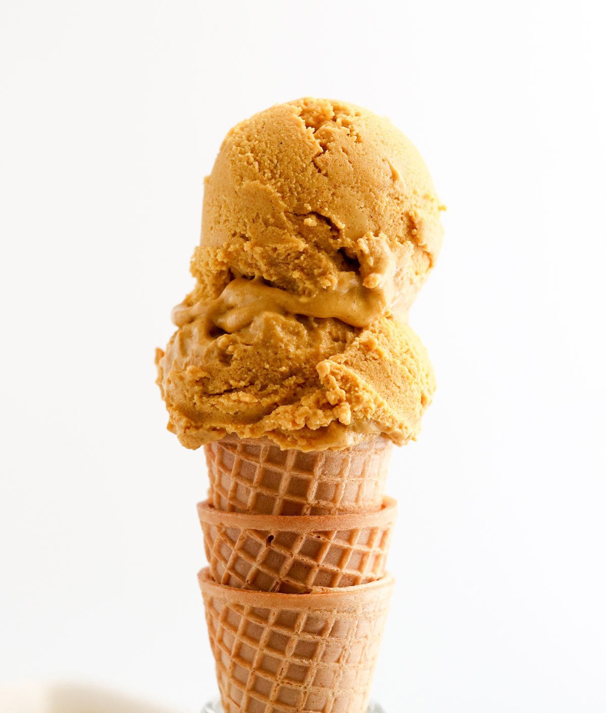 pumpkin ice cream scoops on cone