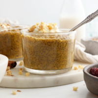 pumpkin chia pudding in glass jar with spoon