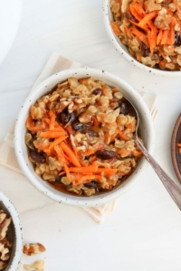 carrot cake oatmeal in 2 bowls with spoons