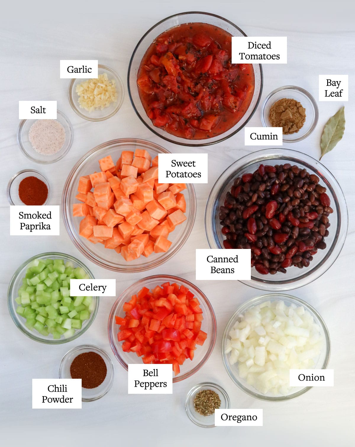 veggie chili ingredients in glass bowls