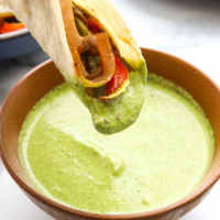 Vegan Fajita dipped in creamy cilantro sauce.