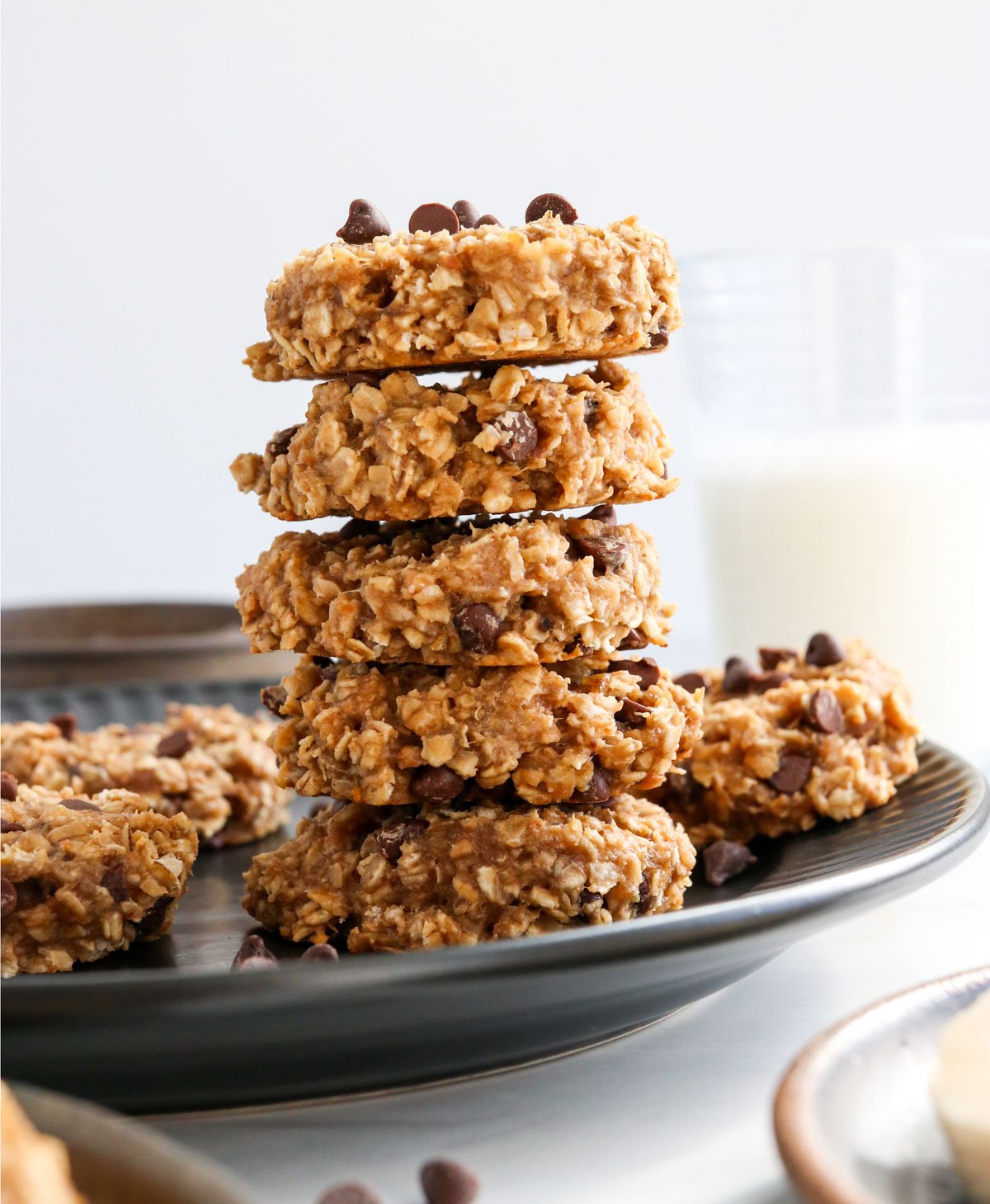 banana oatmeal cookies stacked on plate.