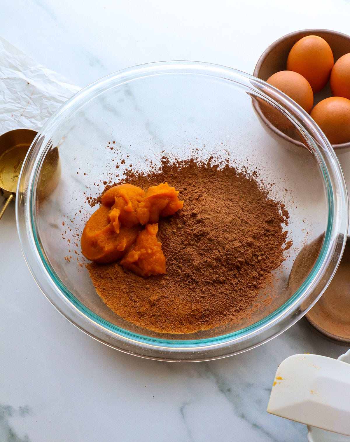 coconut sugar, pumpkin and cacao powder in a large mixing bowl.