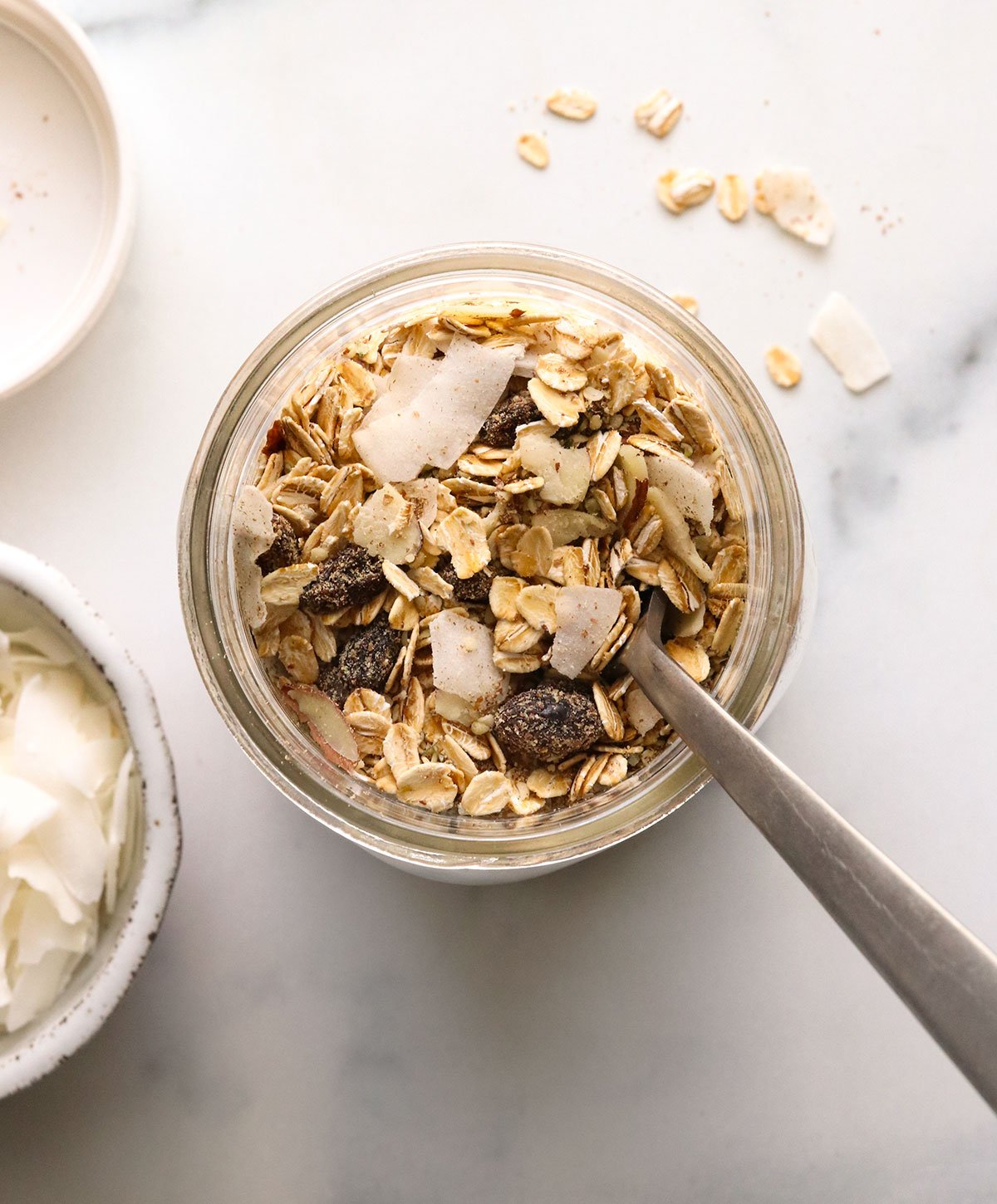 muesli in a jar with a spoon.