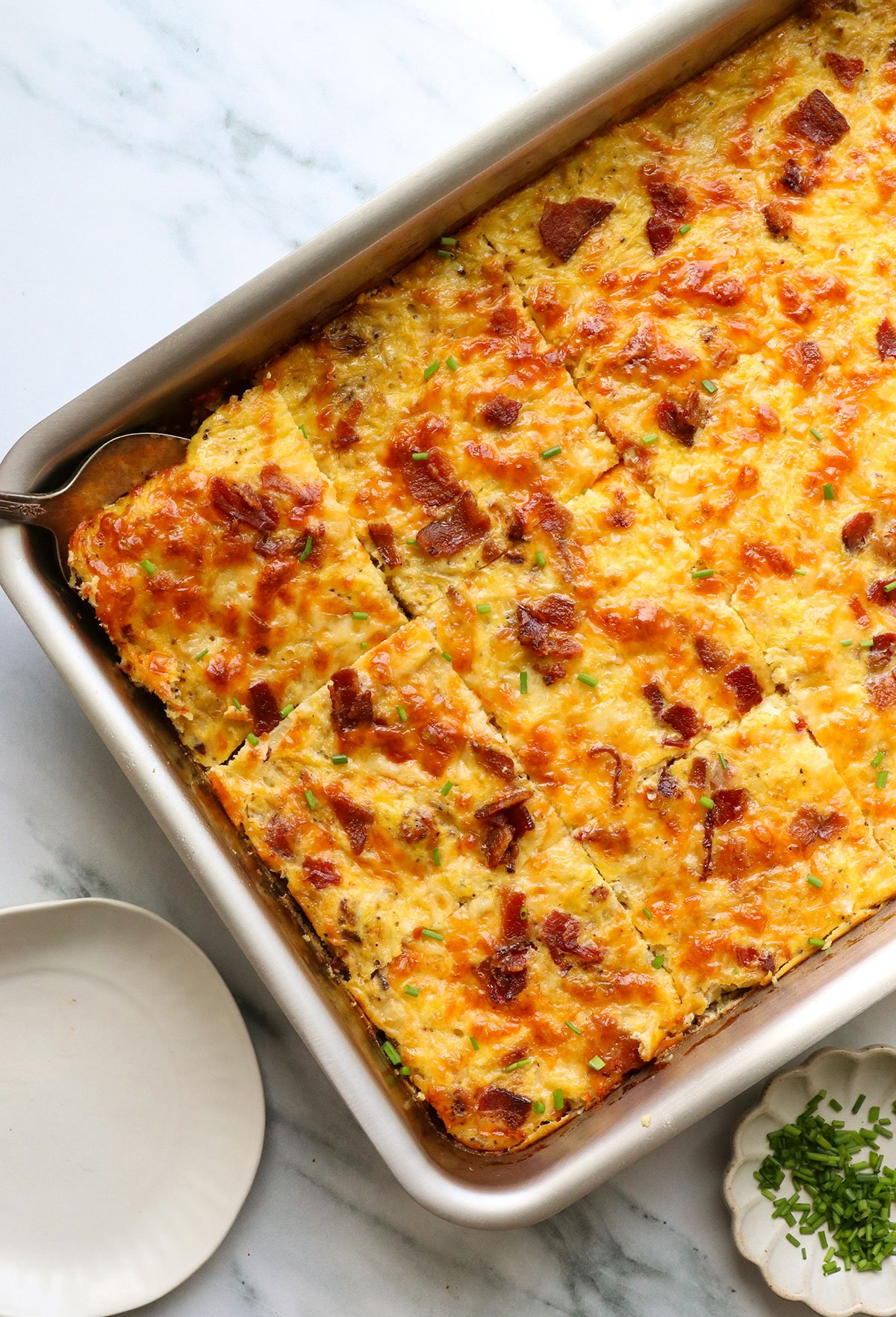 breakfast casserole made with spaghetti squash in a steel pan.