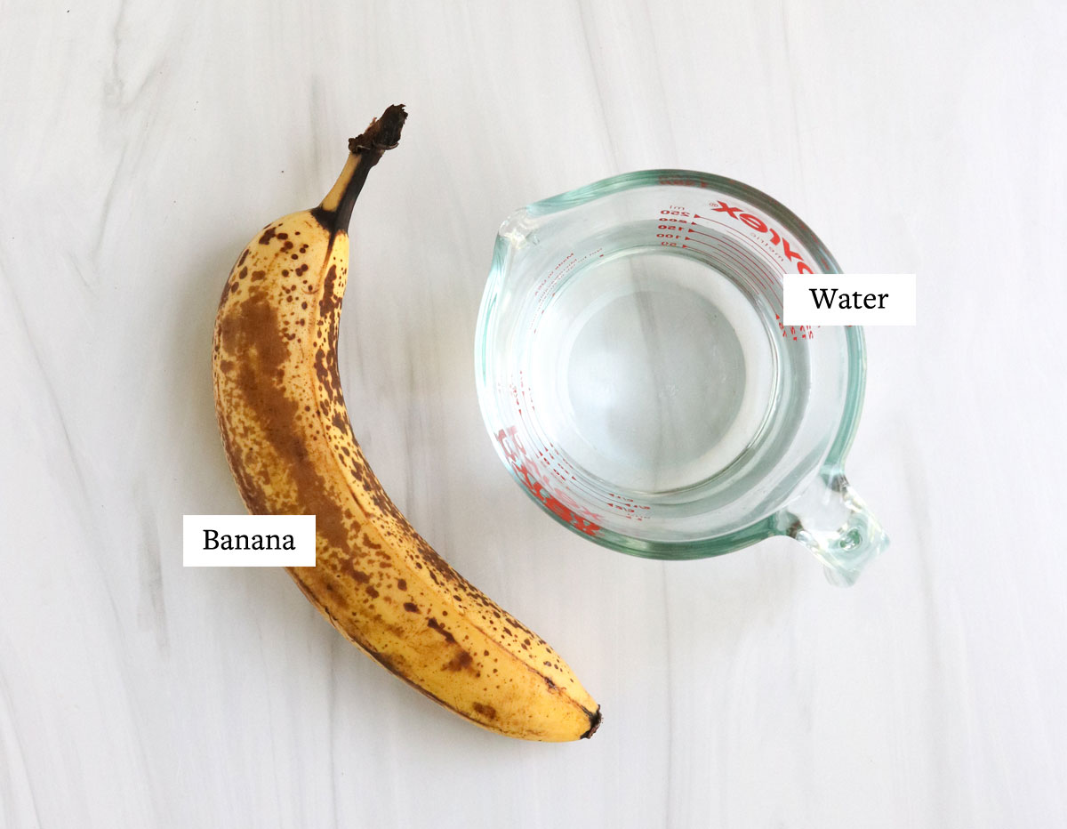 banana milk ingredients labeled on white surface.