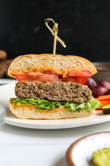 healthy burger sliced in half with toothpick.