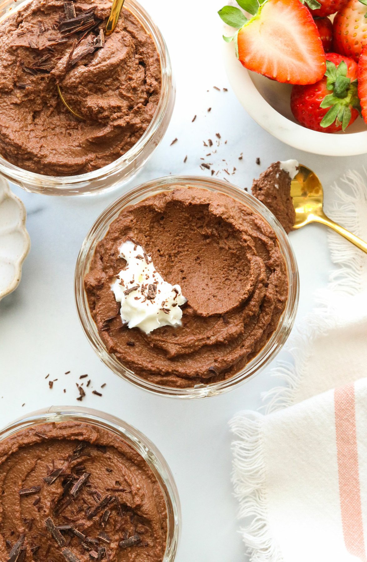 vegan chocolate mousse with spoonful removed.