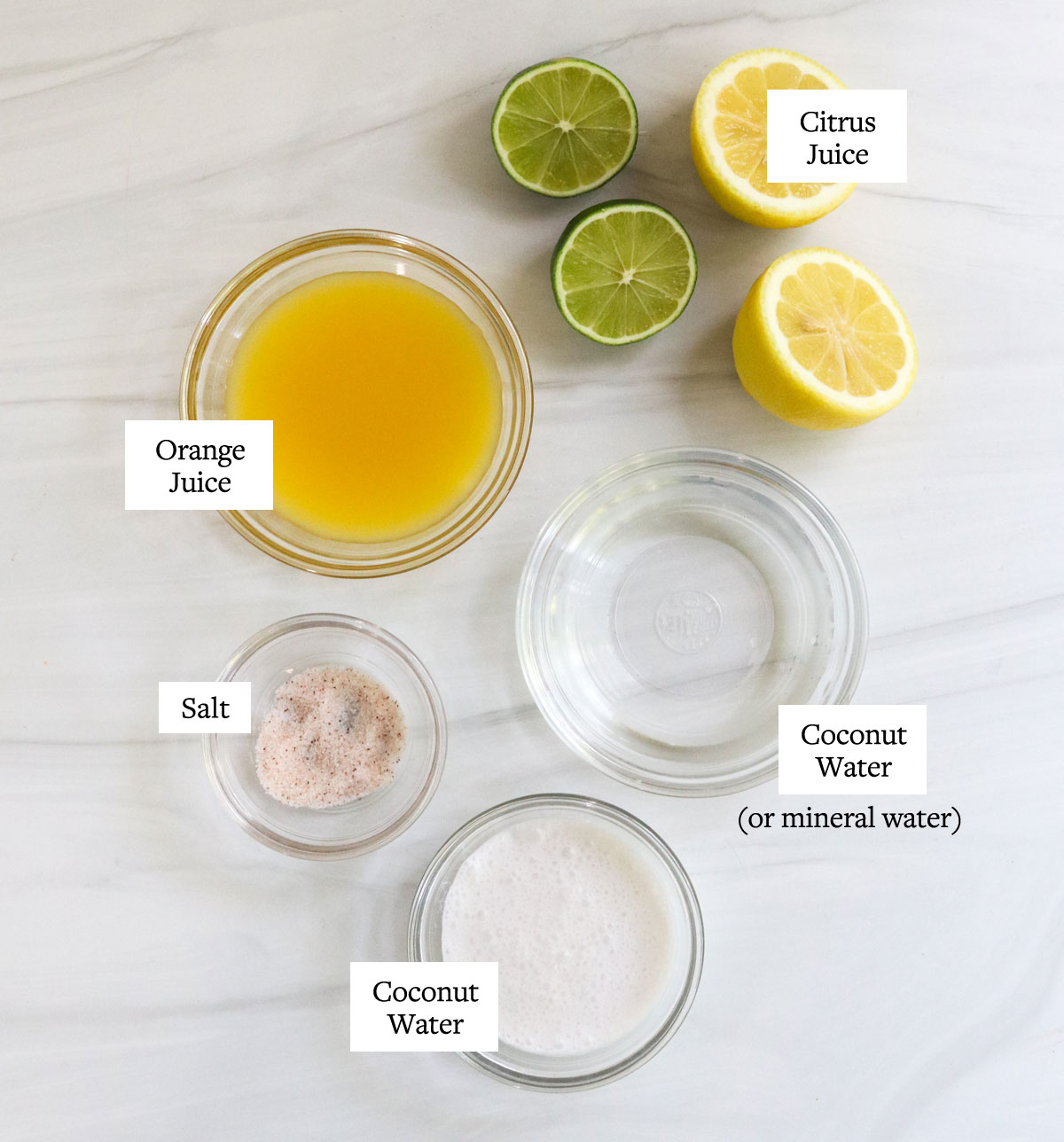 adrenal cocktail ingredients labeled in glass bowls.