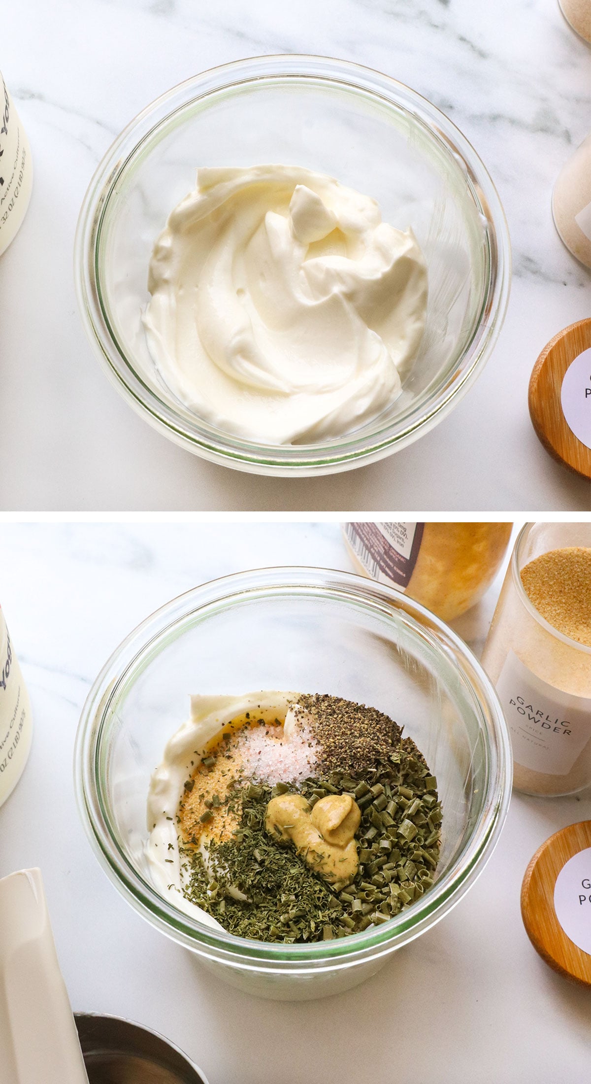 Greek yogurt added to a glass jar with spices and mustard.