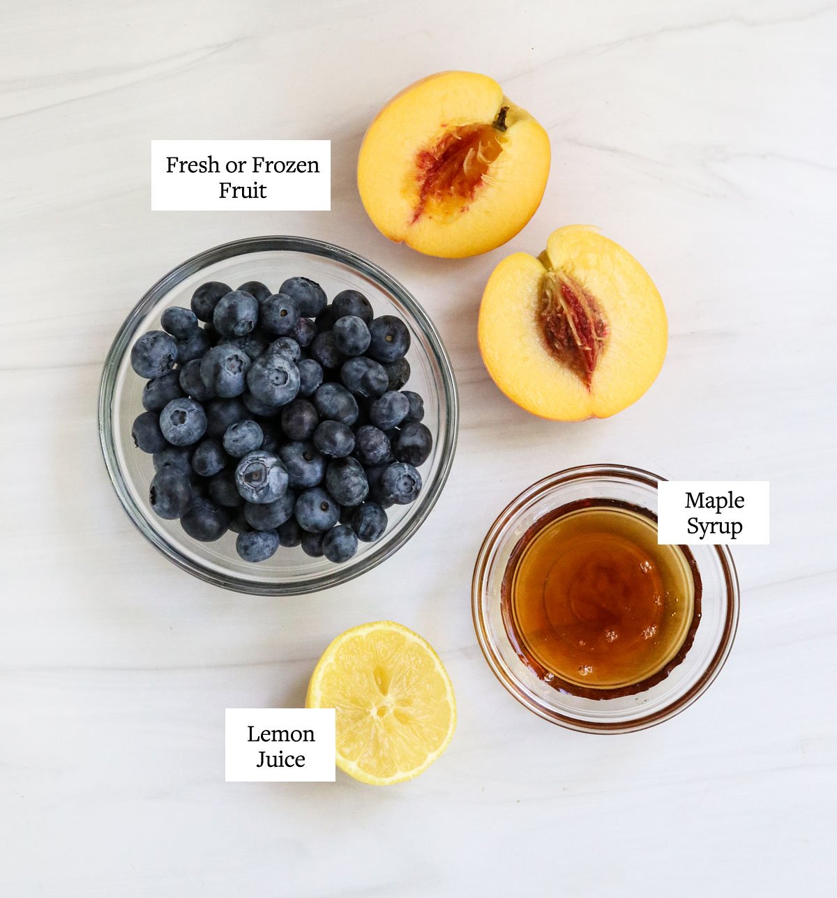 fruit compote ingredients labeled on white surface.