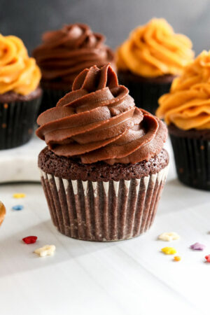 chocolate cupcakes topped with sweet potato frosting.