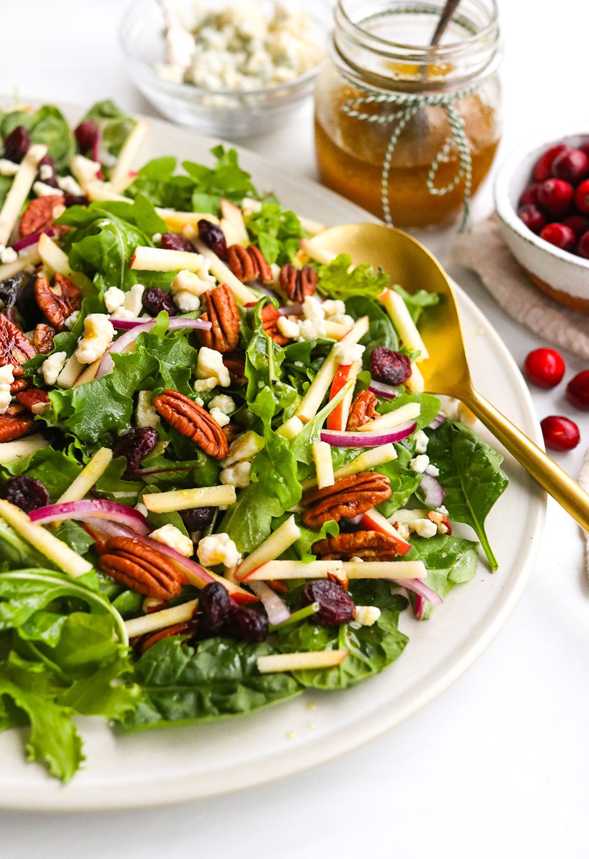 holiday salad topped with apples and pecans.
