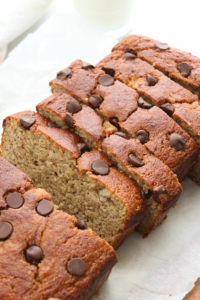 almond flour banana bread sliced and topped with chocolate chips.