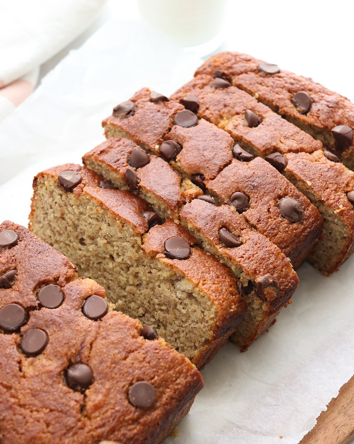 almond flour banana bread sliced and topped with chocolate chips.