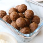 date balls in a glass meal prep container.