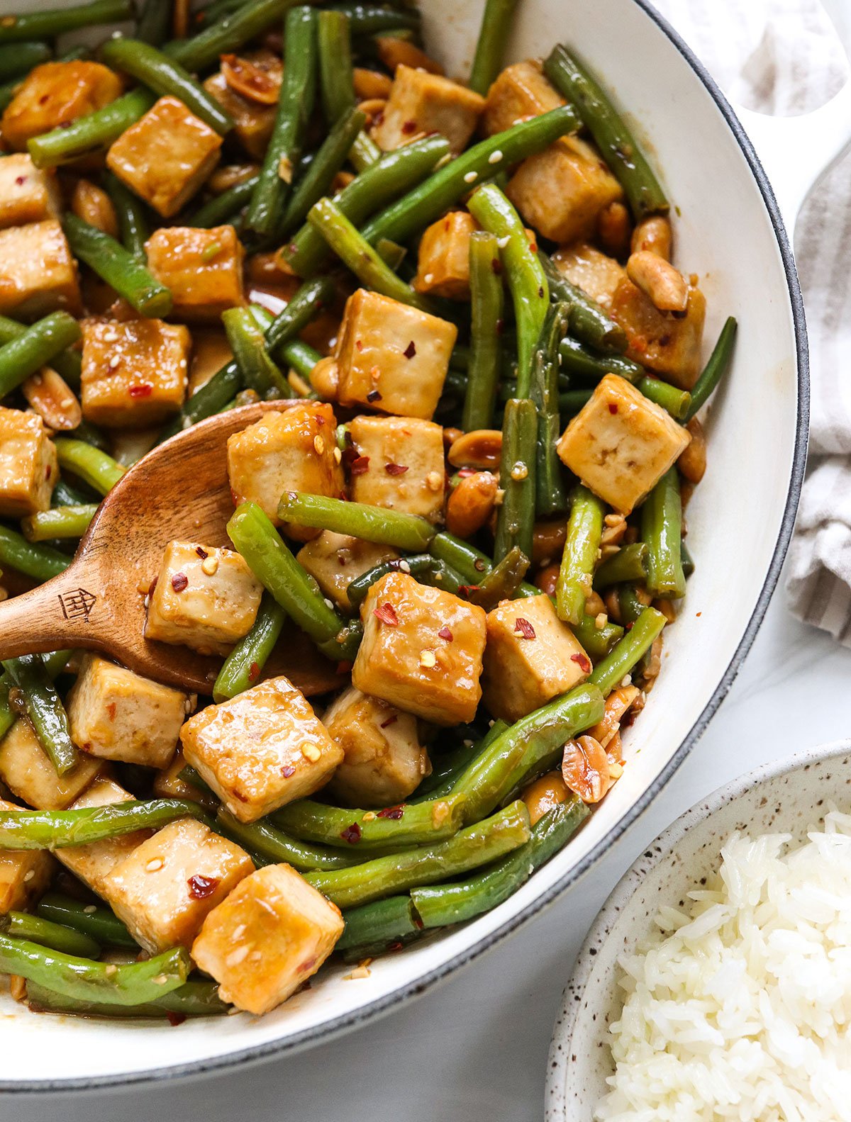 kung pao tofu served in white skillet.