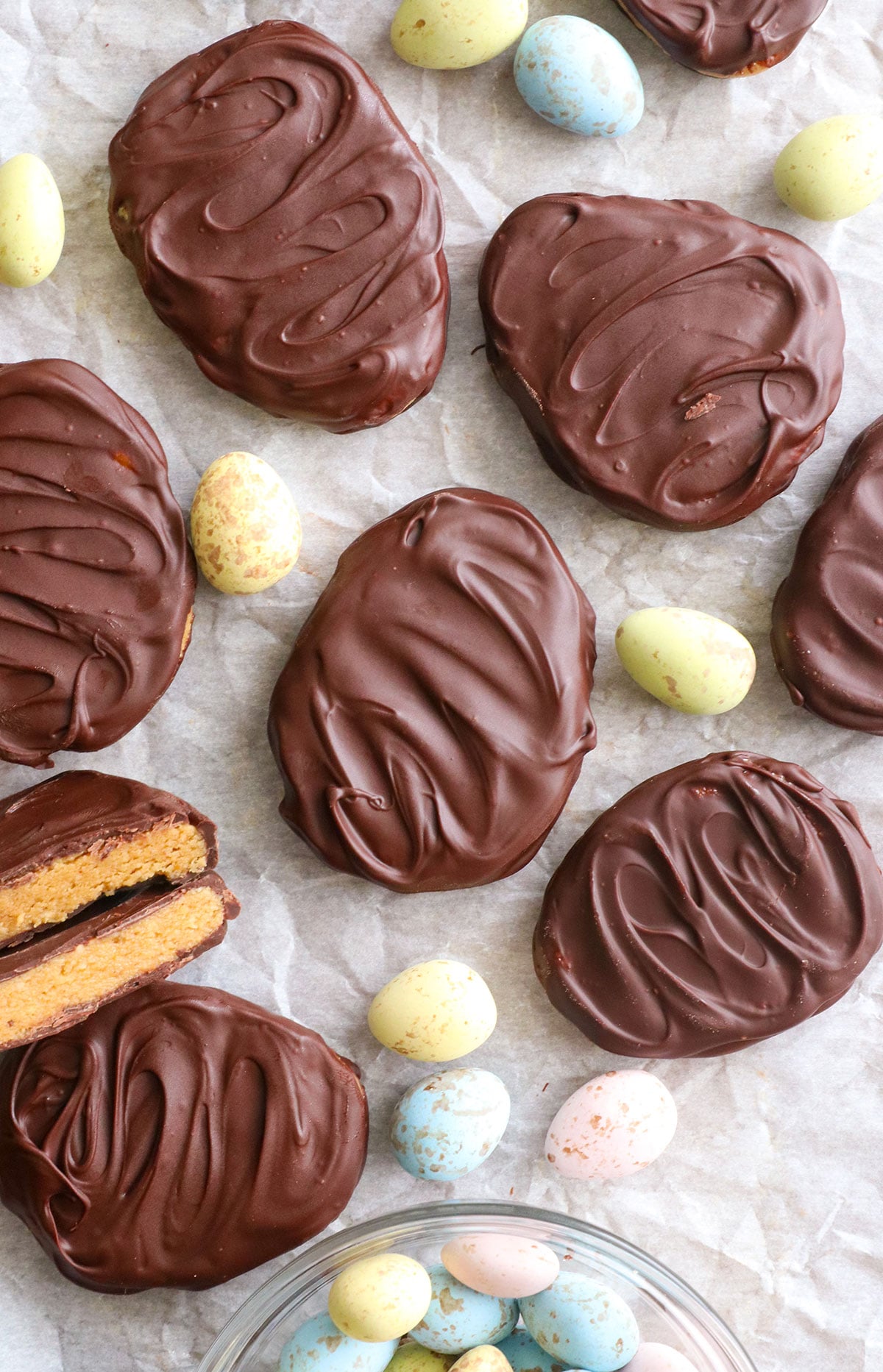 peanut butter eggs on a pan with trader joe's covered almonds.