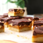Close-up of a healthy snickers bar to show the layers of caramel, chocolate, and peanuts.