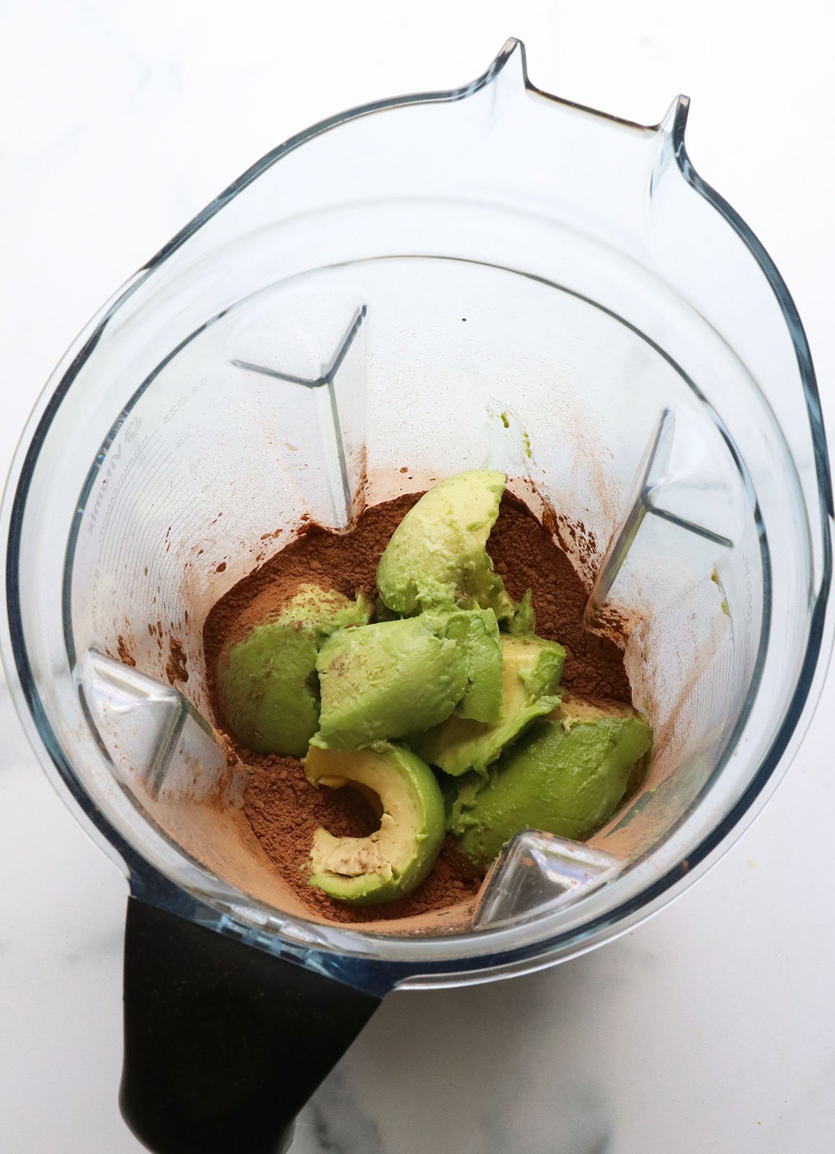 avocado and cocoa powder in a blender.
