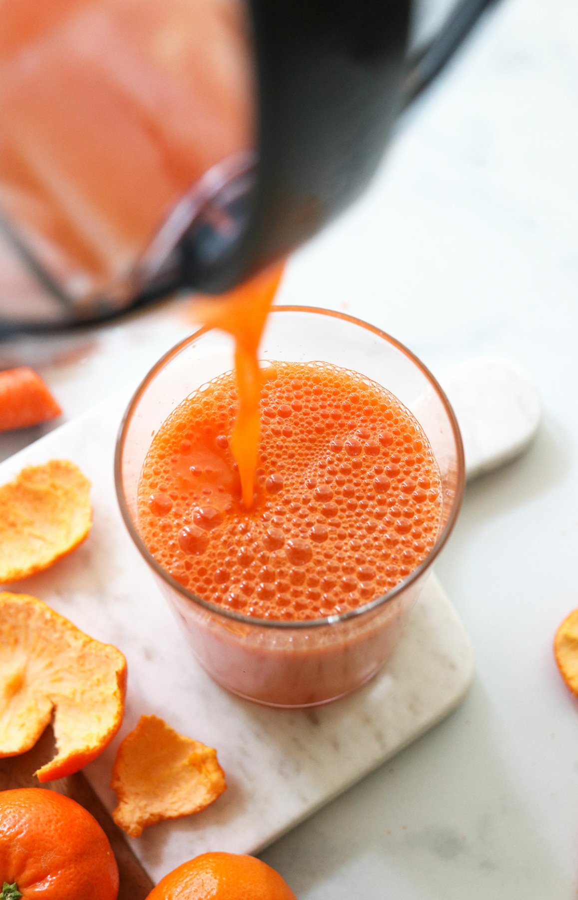 https://detoxinista.com/wp-content/uploads/2023/06/poured-carrot-juice-in-glass-1157x1800.jpg