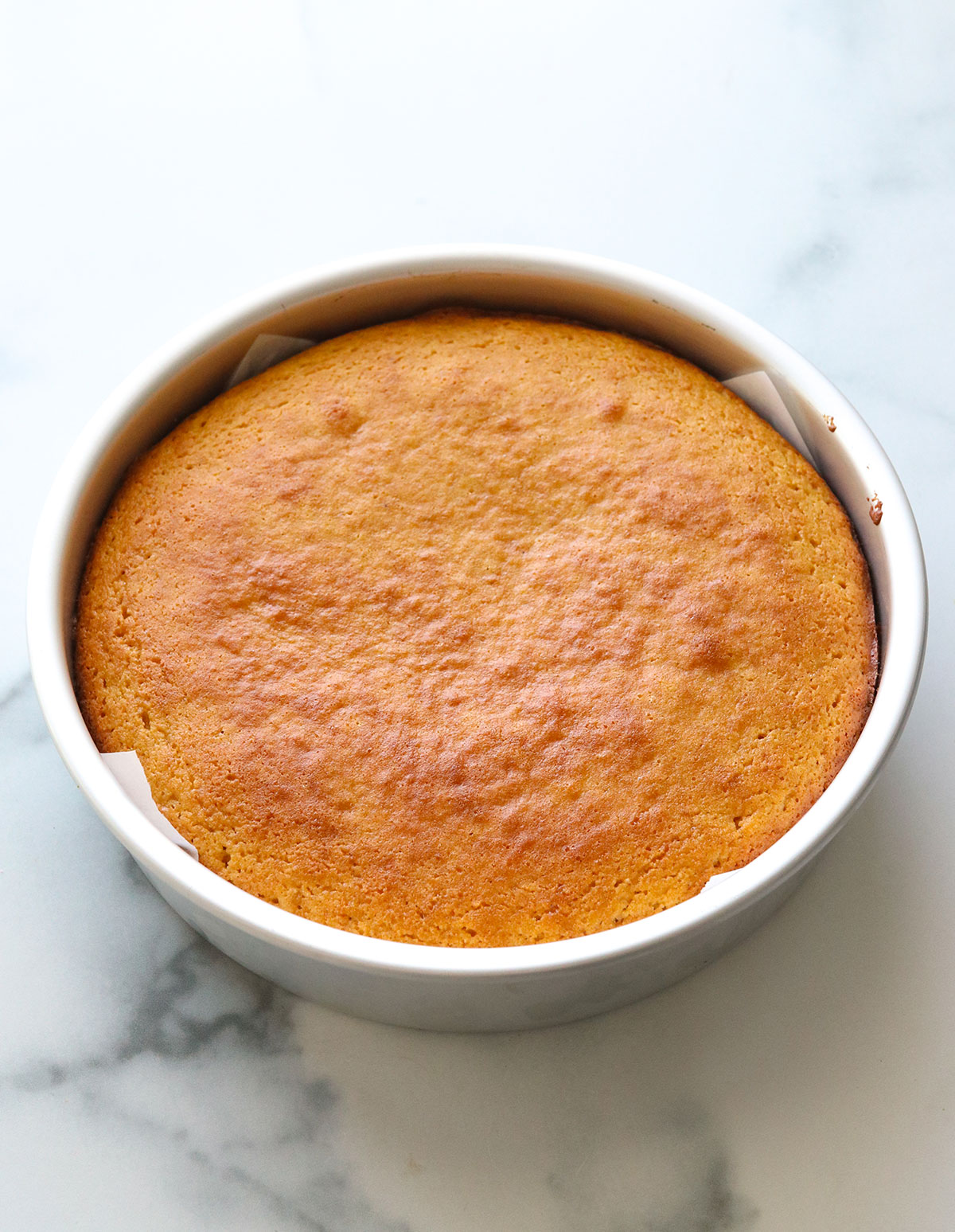 almond flour cake baked in an 8-inch pan.
