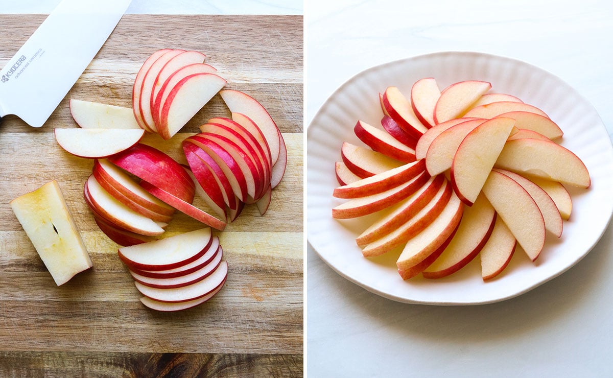 apples thinly sliced on a cutting board and fanned out on a white plate.