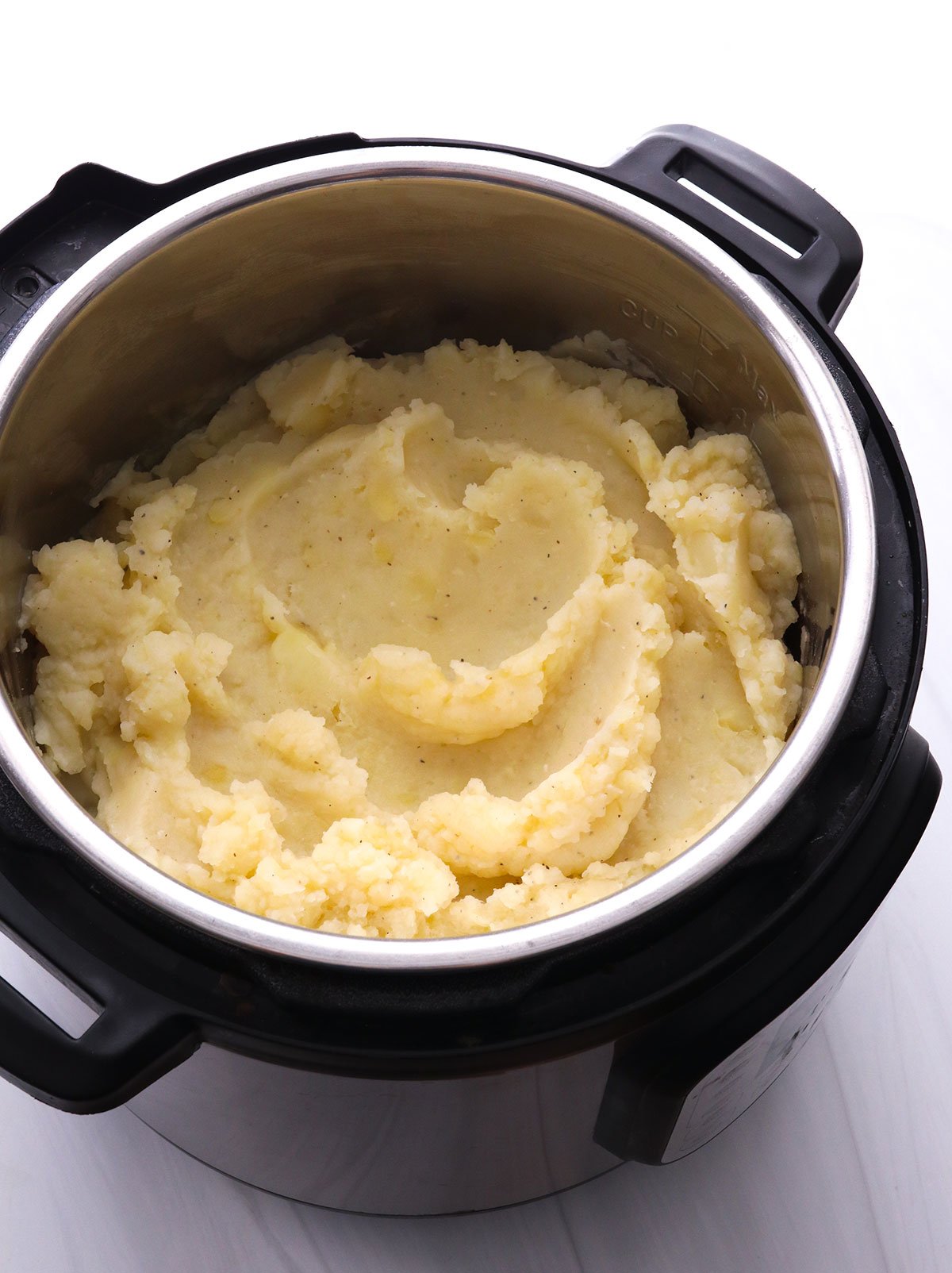 mashed potatoes sitting in the Instant Pot.
