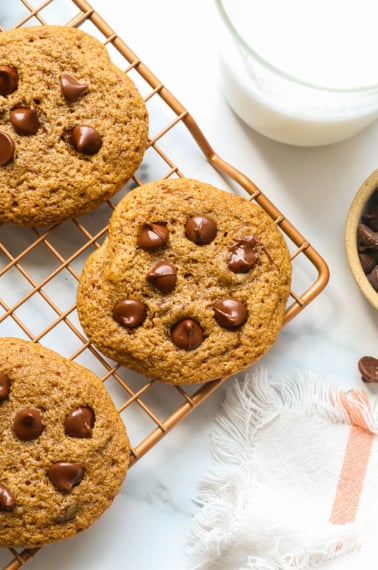 oat flour chocolate chip cookie on a rack.