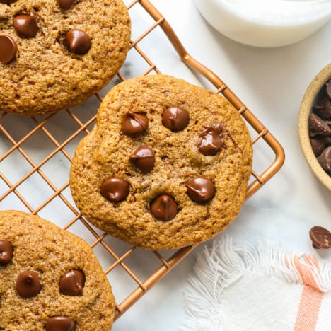 oat flour chocolate chip cookie on a rack.