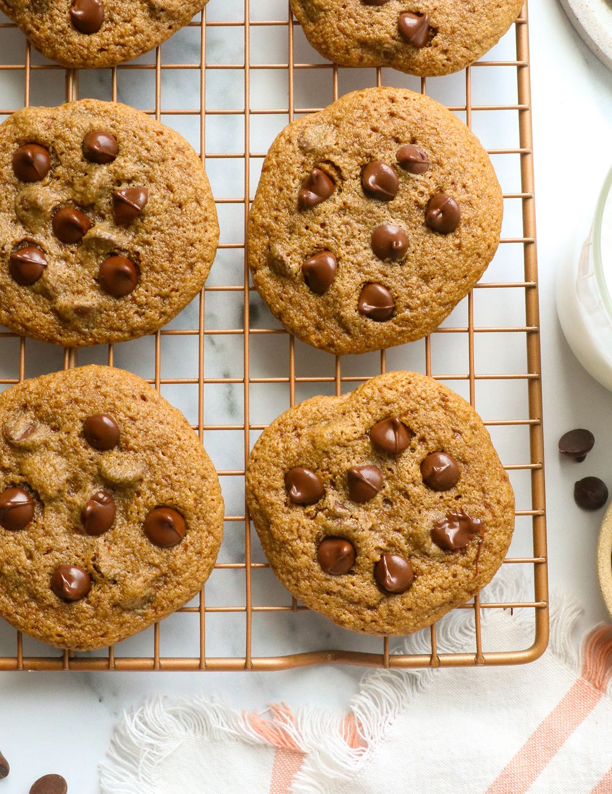 oat flour chocolate chip cookies cooling on a wire rack. 