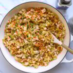 egg roll in a bowl with tofu in a large white skillet.