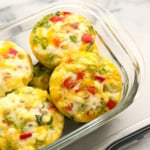 egg muffins in a glass storage container.