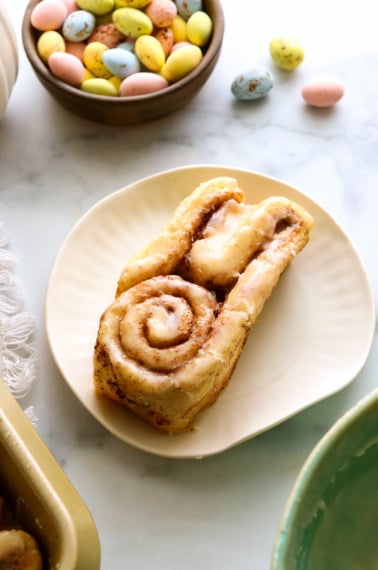 bunny cinnamon roll on a white plate.