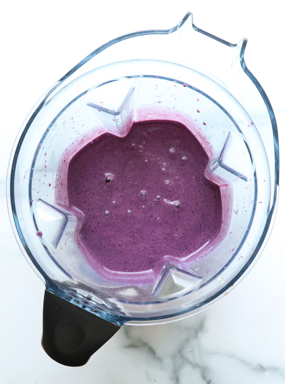 blueberry smoothie blended in the pitcher.