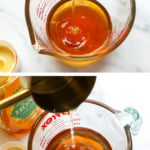 honey and boiled water added to a glass measuring cup.