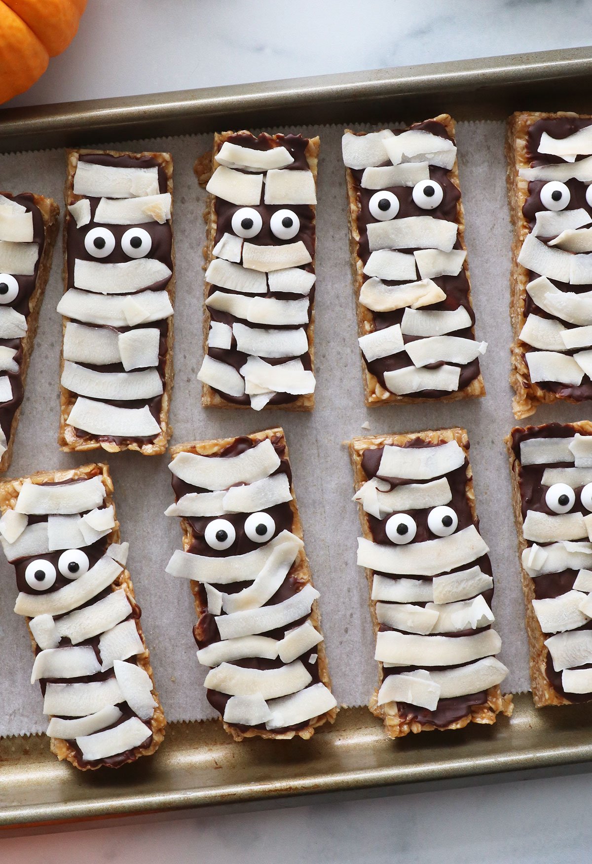 mummy granola bars on a baking sheet.