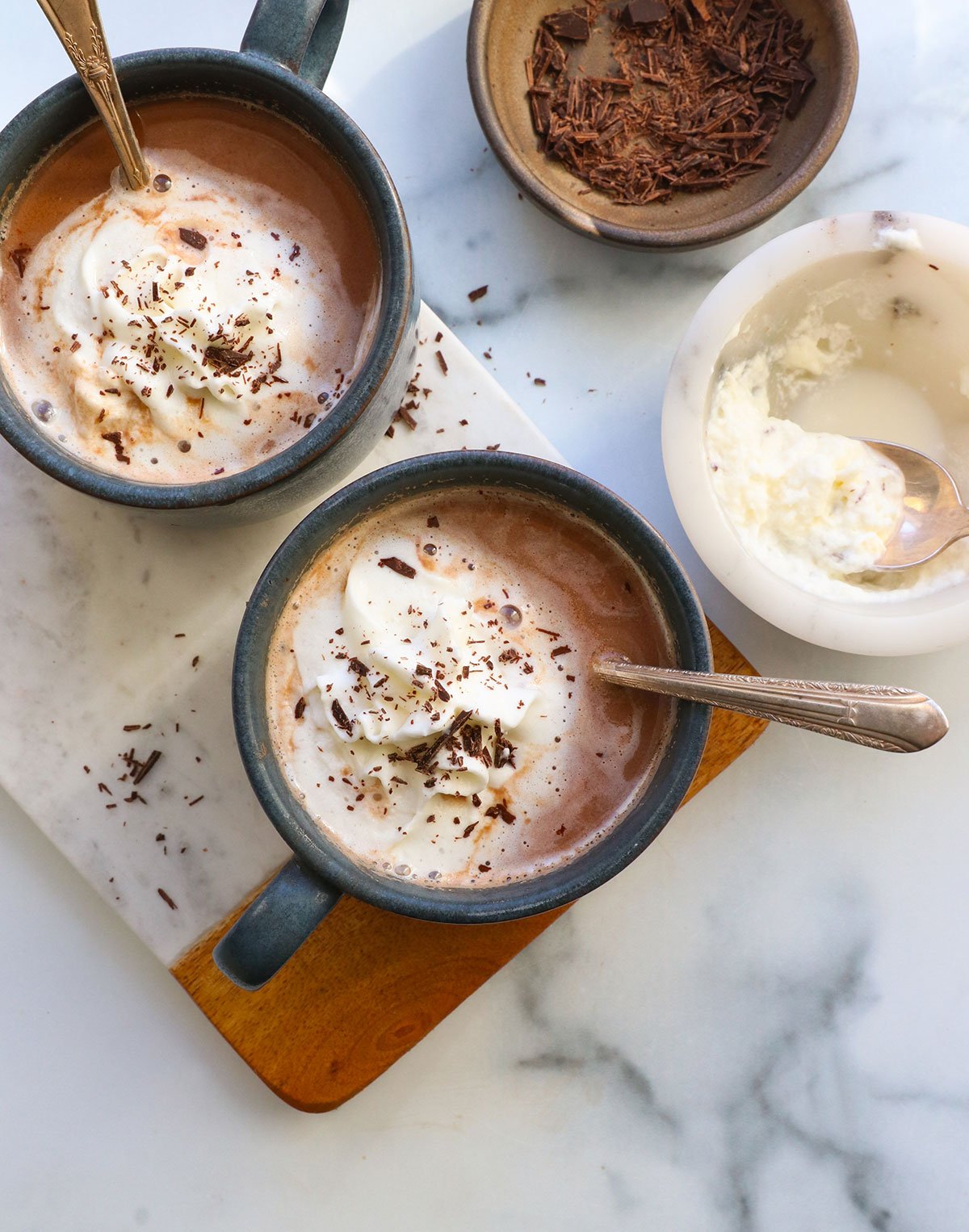 healthy hot chocolate topped with whipped cream and shaved chocolate.