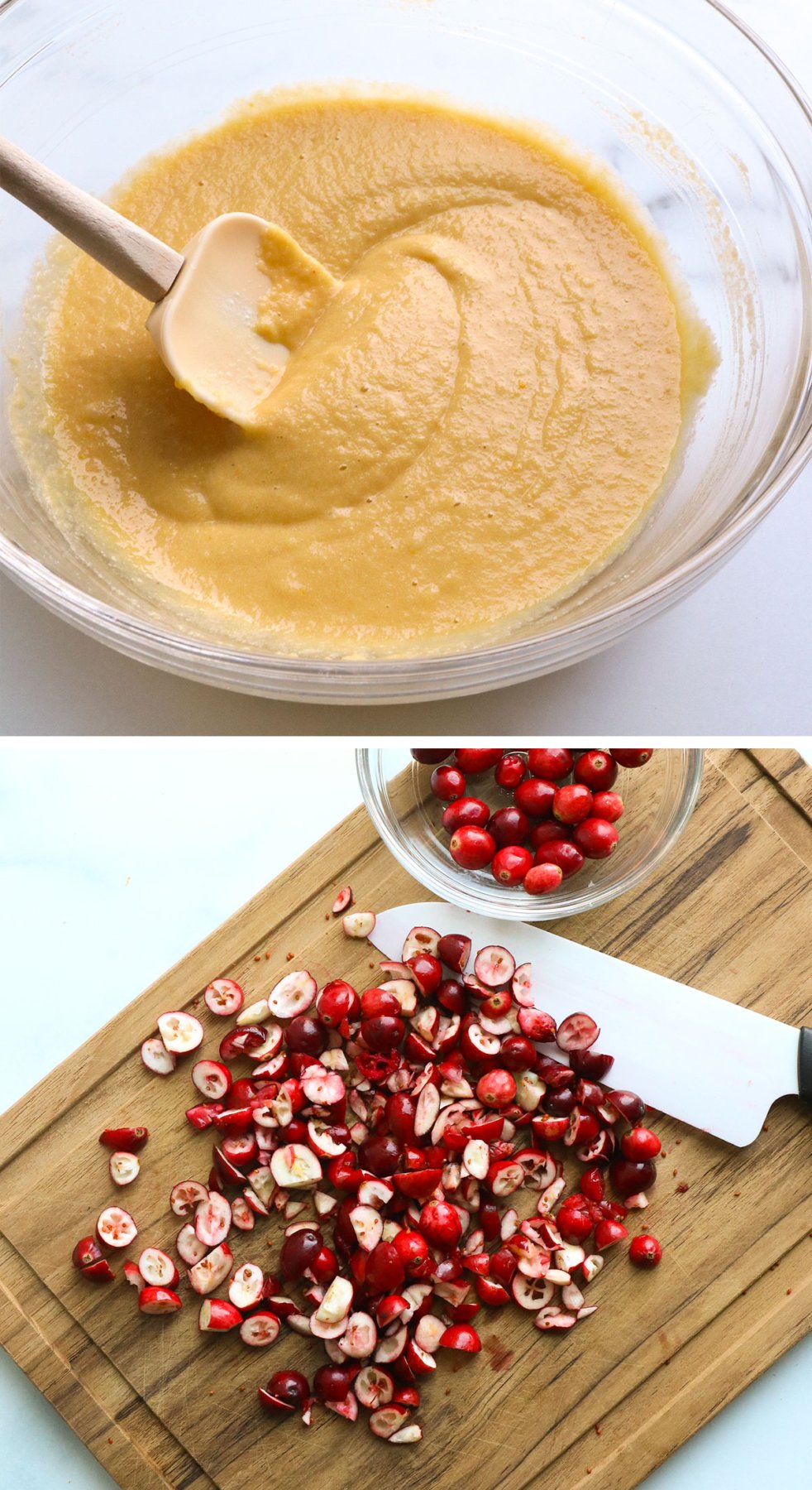 almond flour muffin batter stirred in a bowl and cranberries chopped on a cutting board.