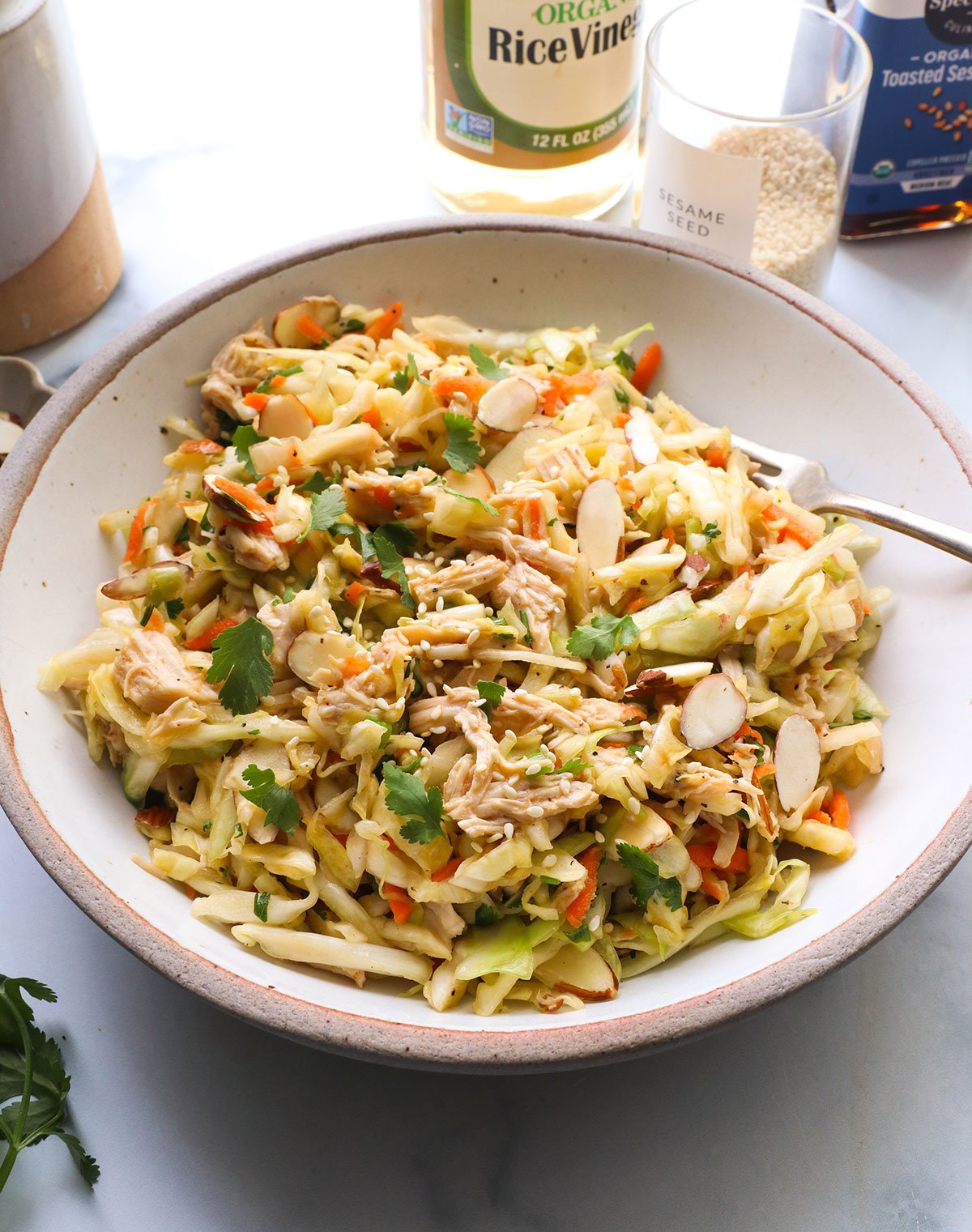 shredded chicken and cilantro on a cabbage salad.