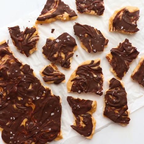 banana bark broken into pieces on parchment paper.