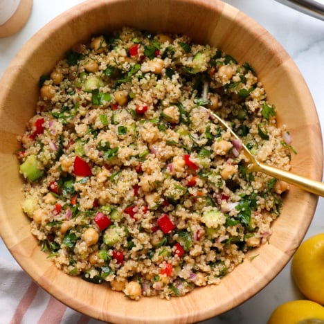 quinoa salad served in a wood bowl.