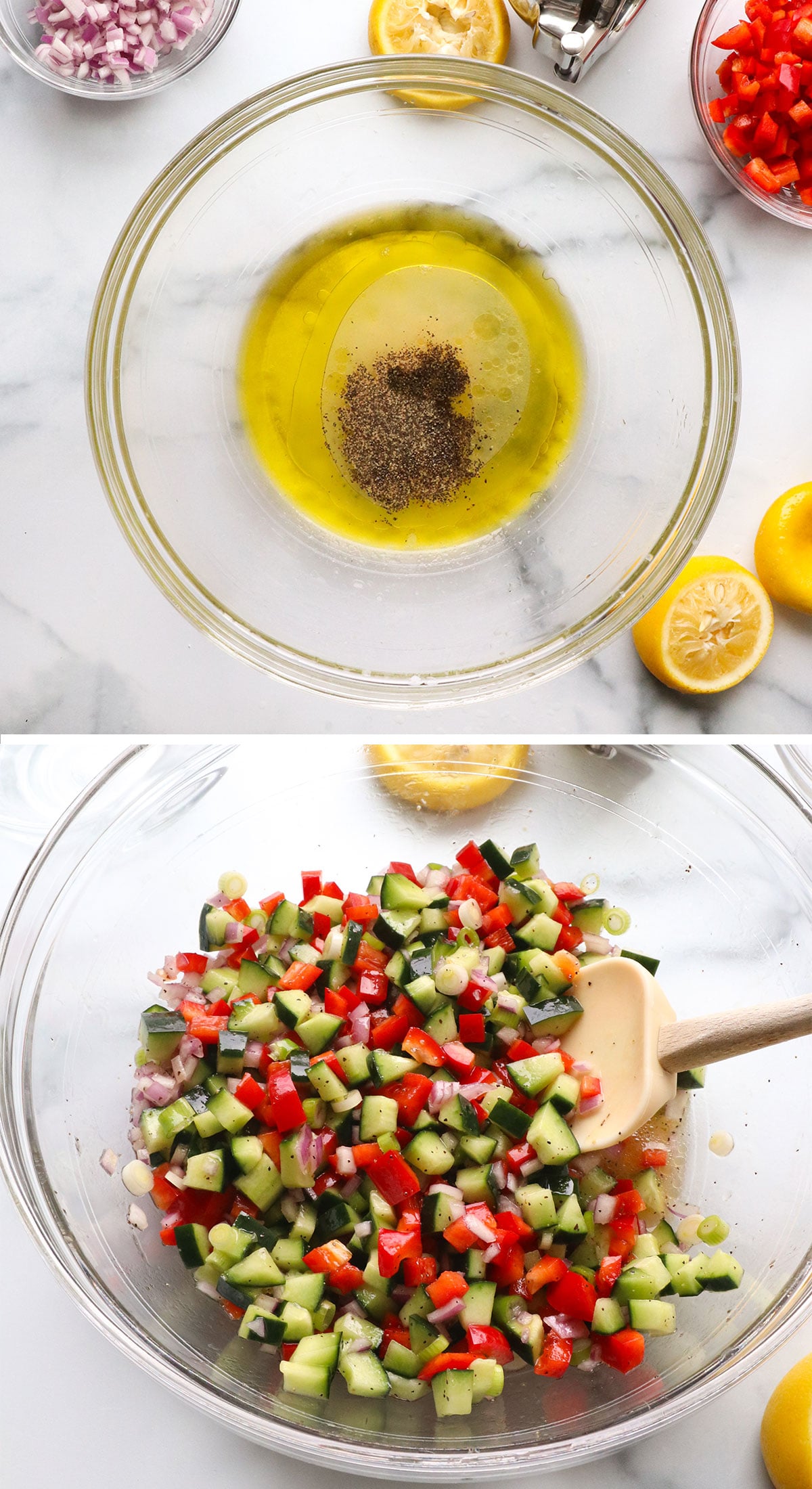 lemon juice dressing in a glass bowl tossed with chopped veggies.