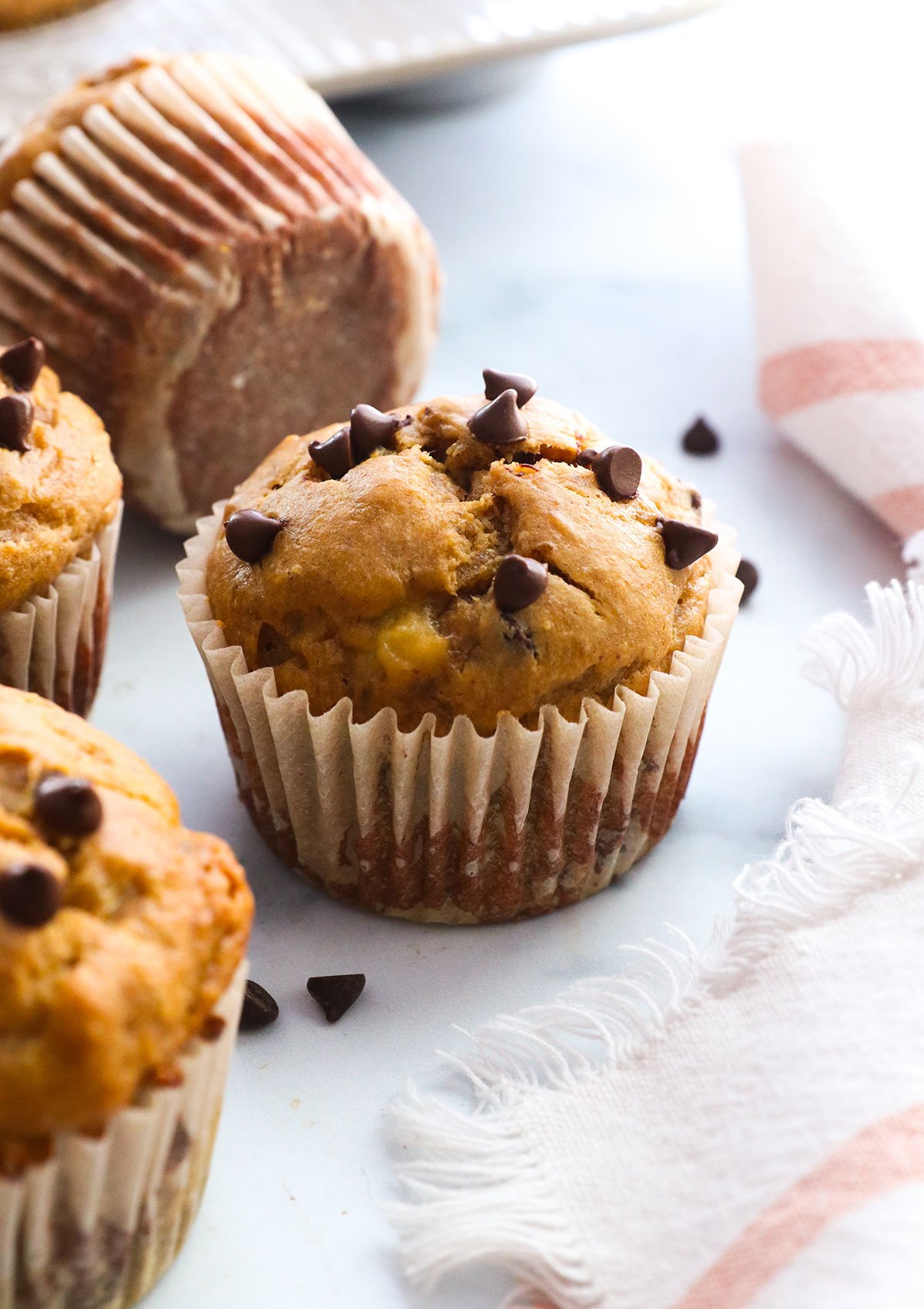 protein banana muffin topped with chocolate chips.