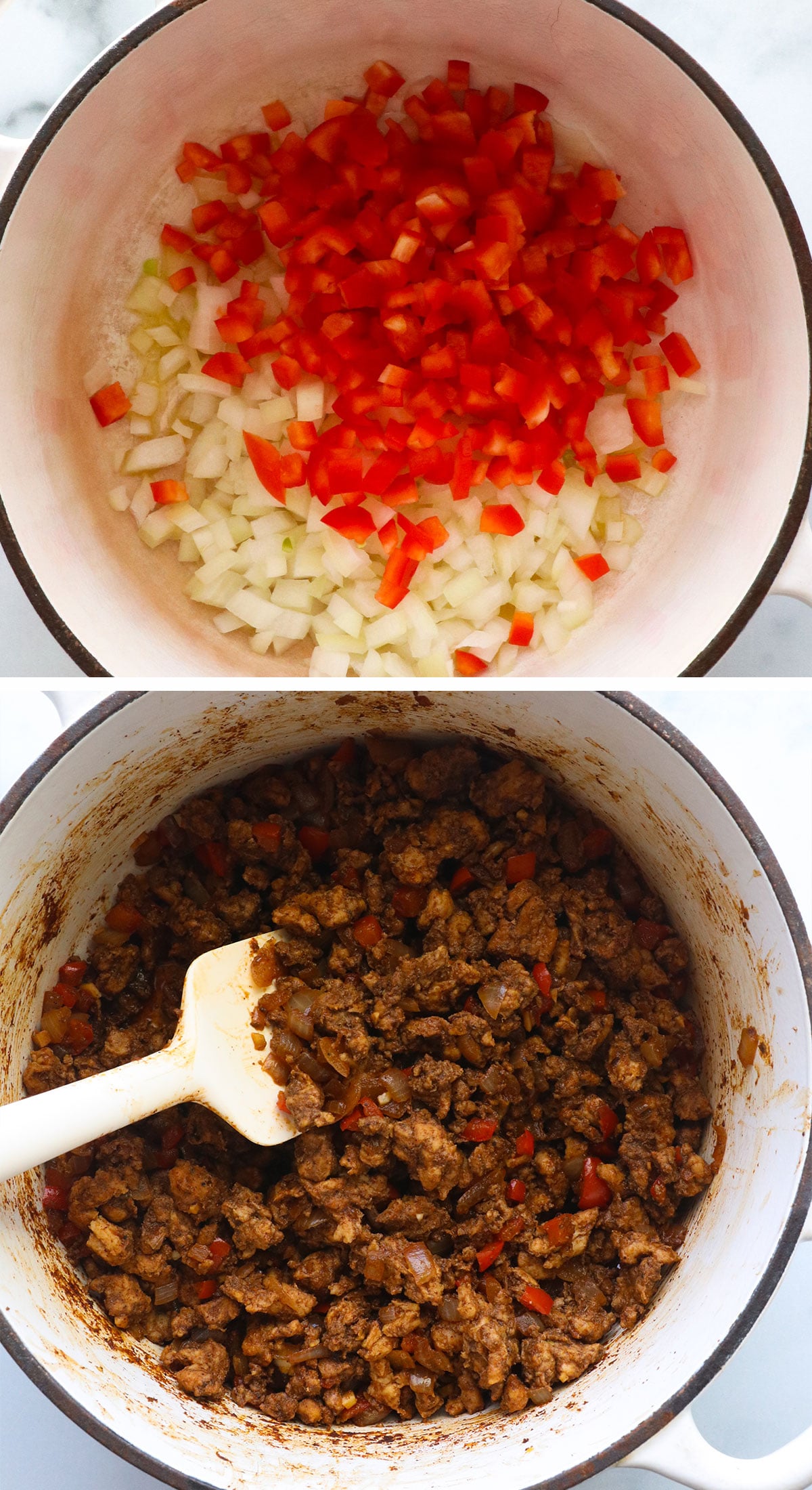 onions and peppers sauteed with ground turkey in a white pot.