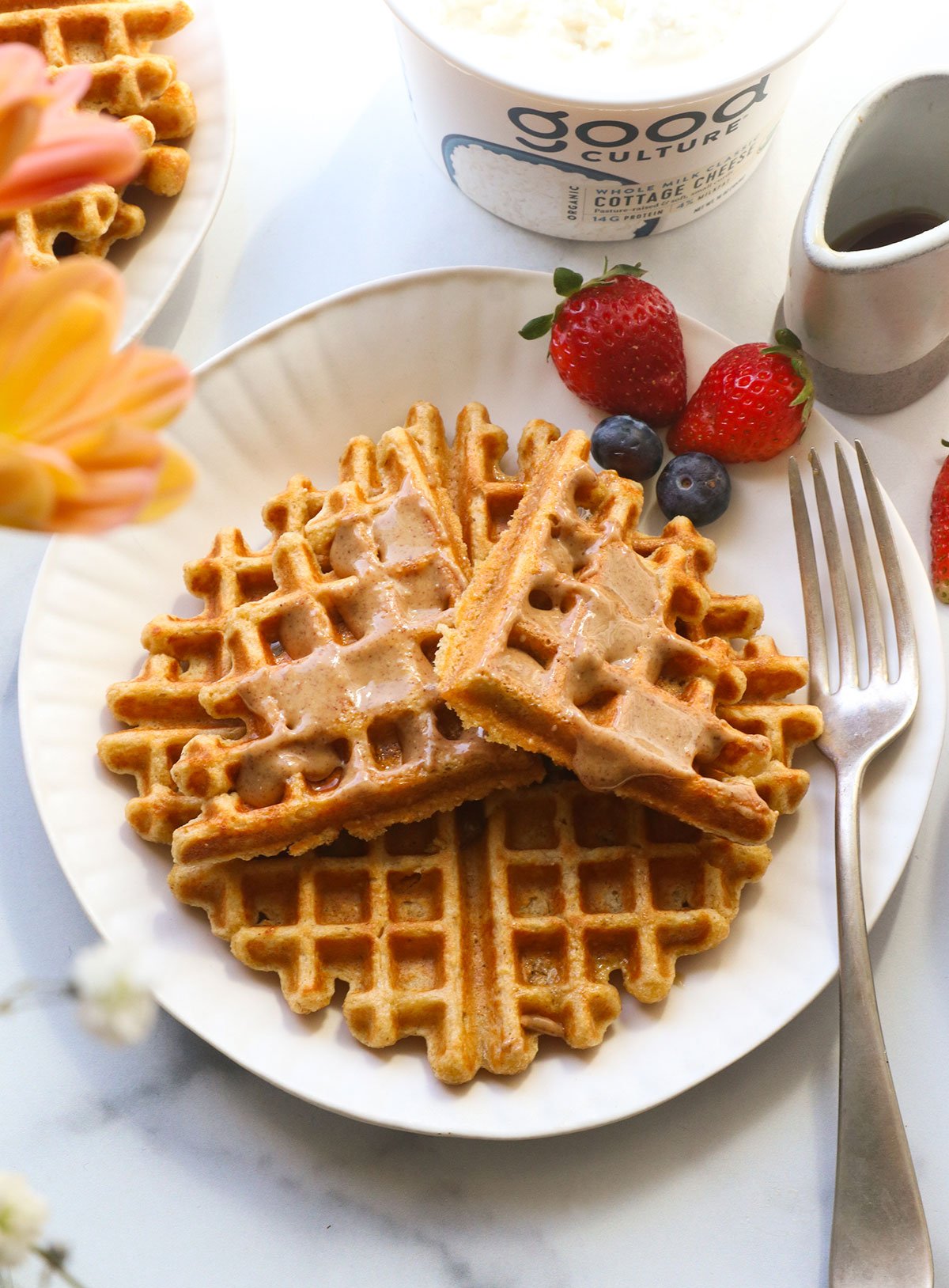 cottage cheese waffles topped with peanut butter.